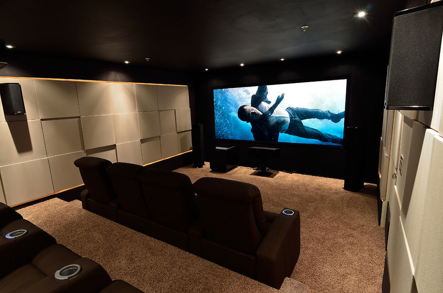 Immersive theater with acoustic wall panels